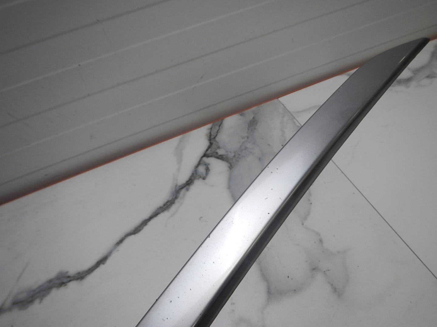 Молдинг переднего бампера левый