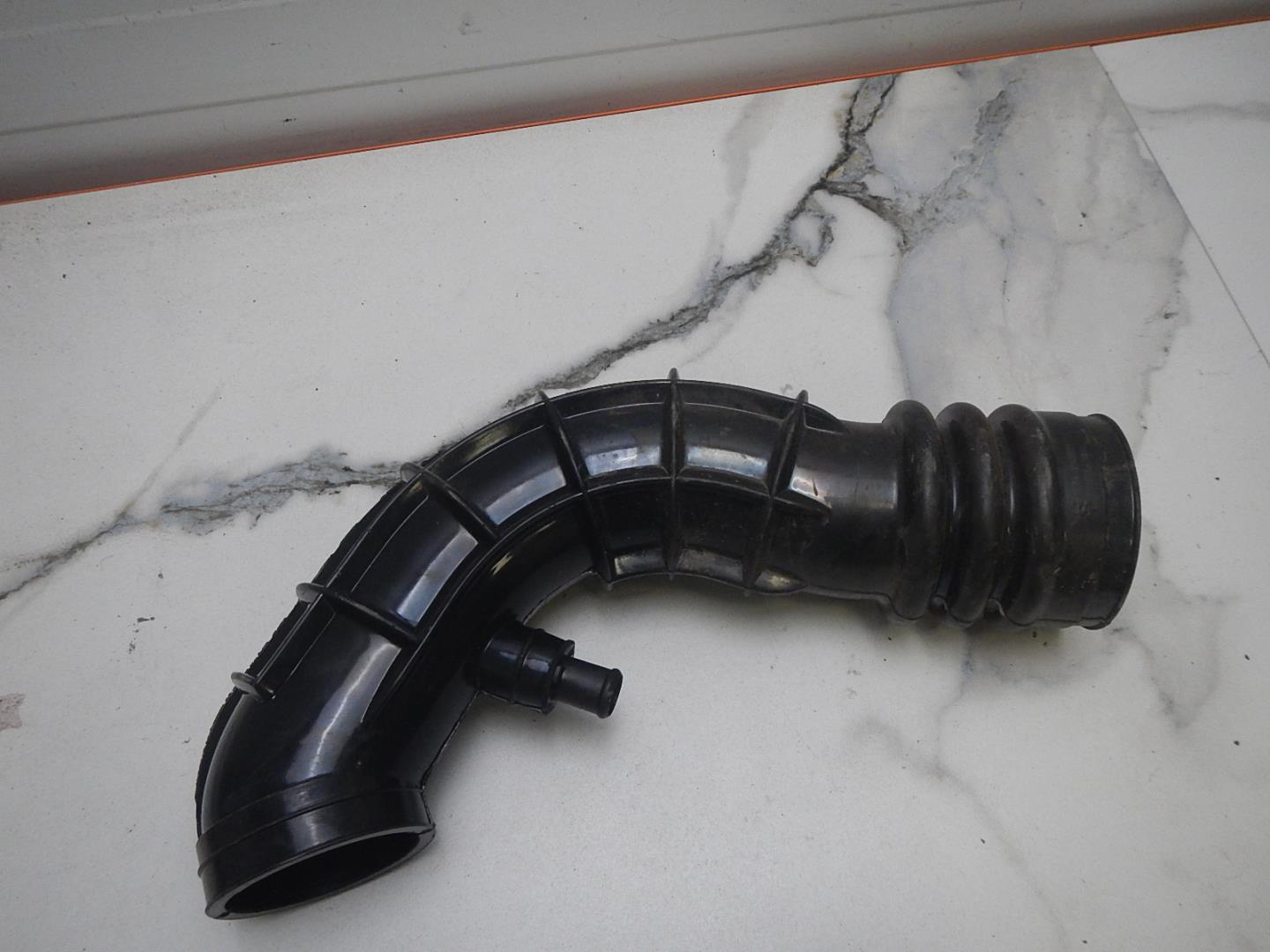 Патрубок воздушного фильтра