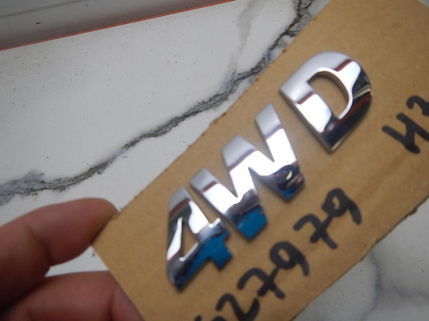 Эмблема на крышку багажника