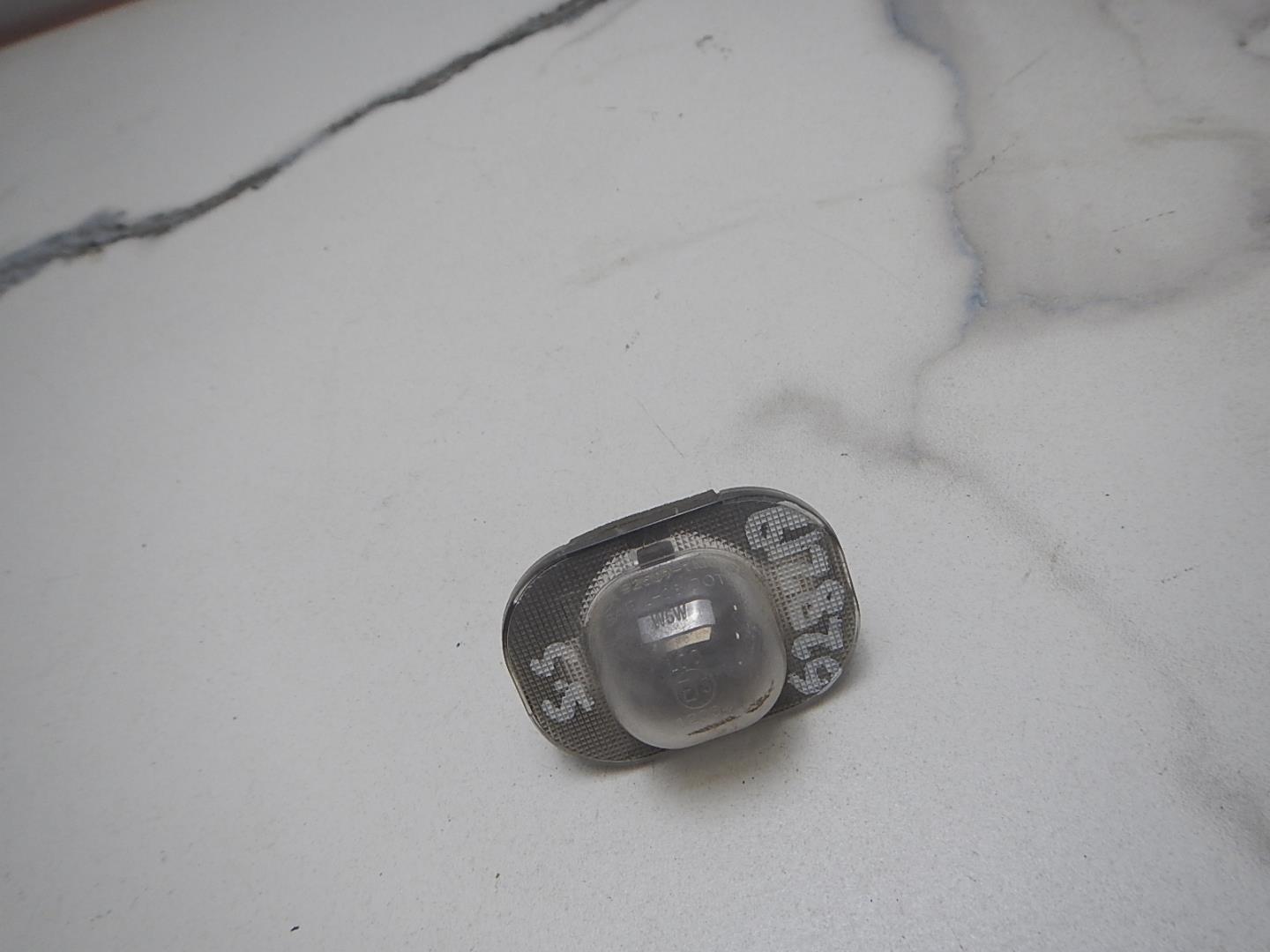 Фонарь подсветки номера