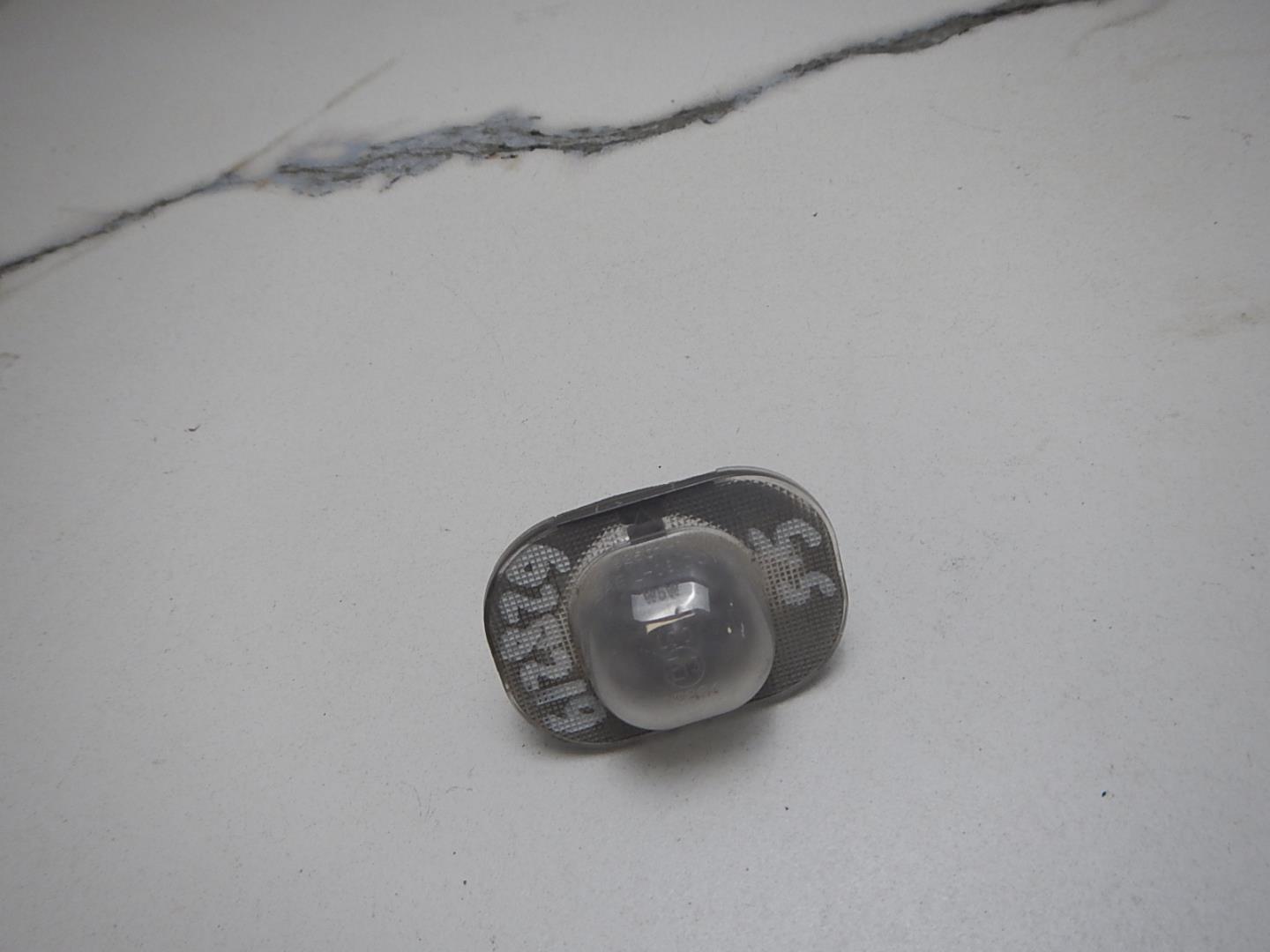 Фонарь подсветки номера