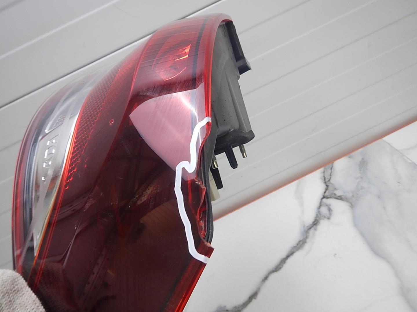 Фонарь задний левый