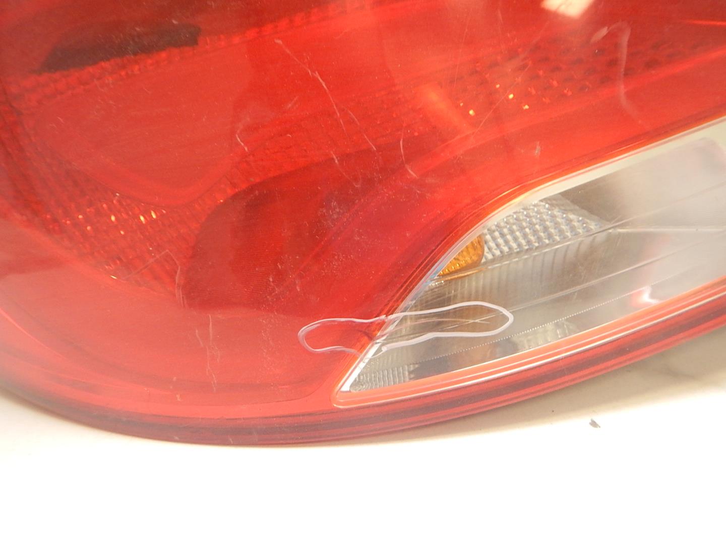 Фонарь задний левый