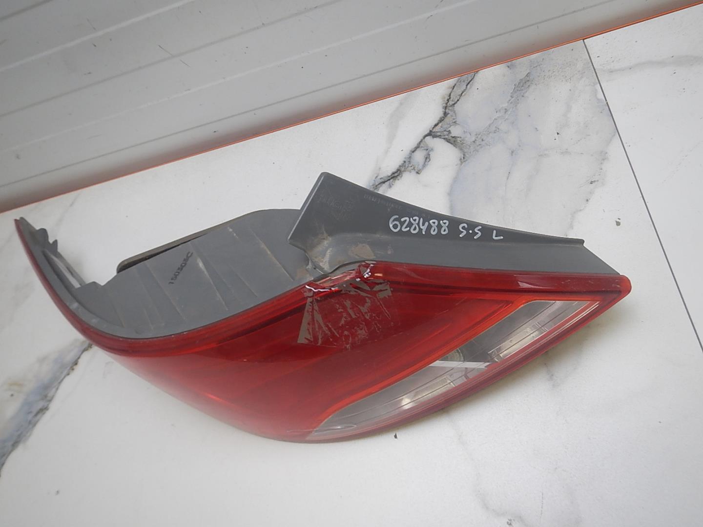 Фонарь задний левый