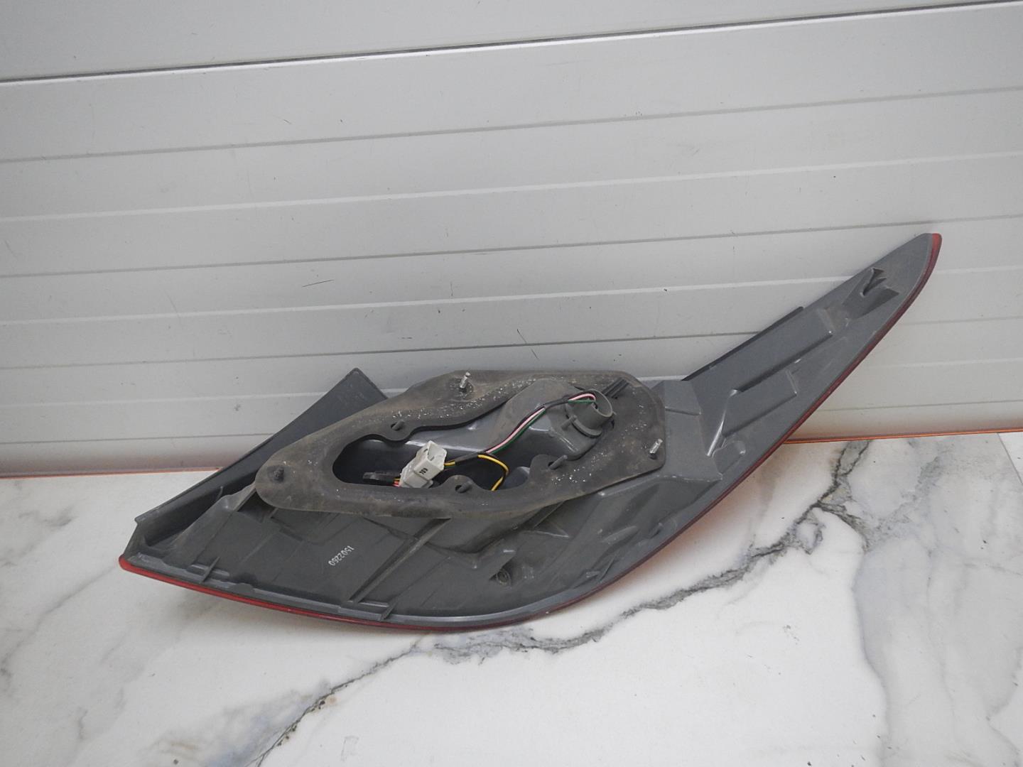 Фонарь задний левый