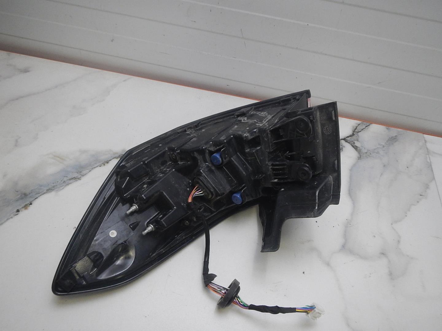 Фонарь задний левый