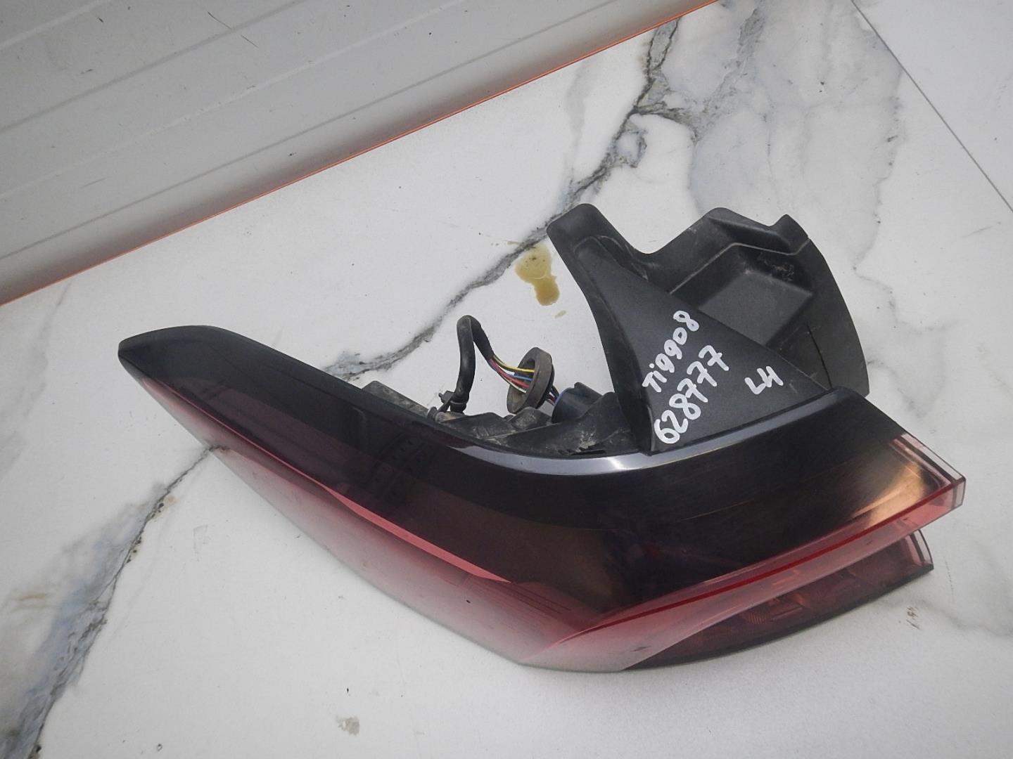 Фонарь задний левый