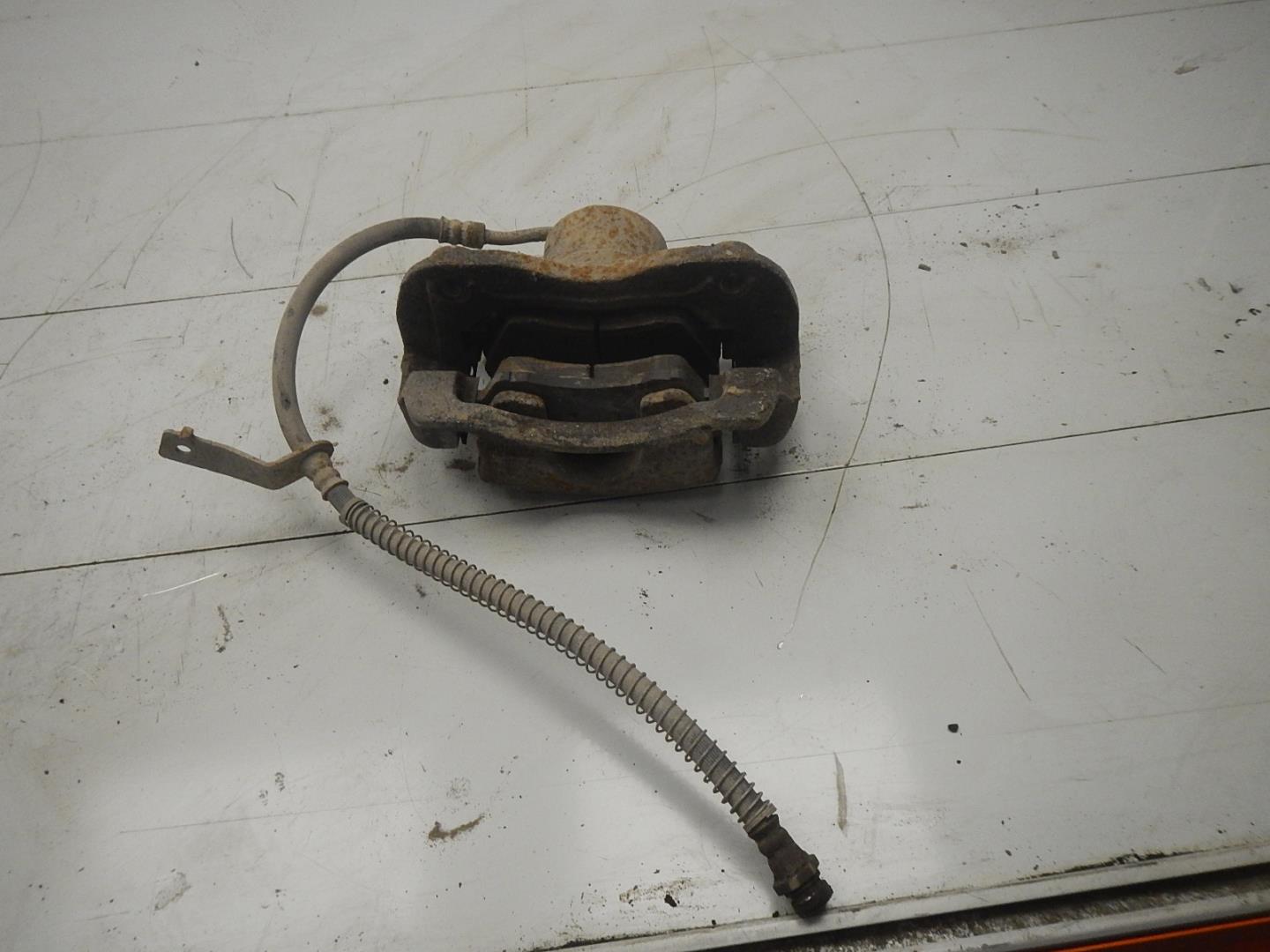 Суппорт передний левый