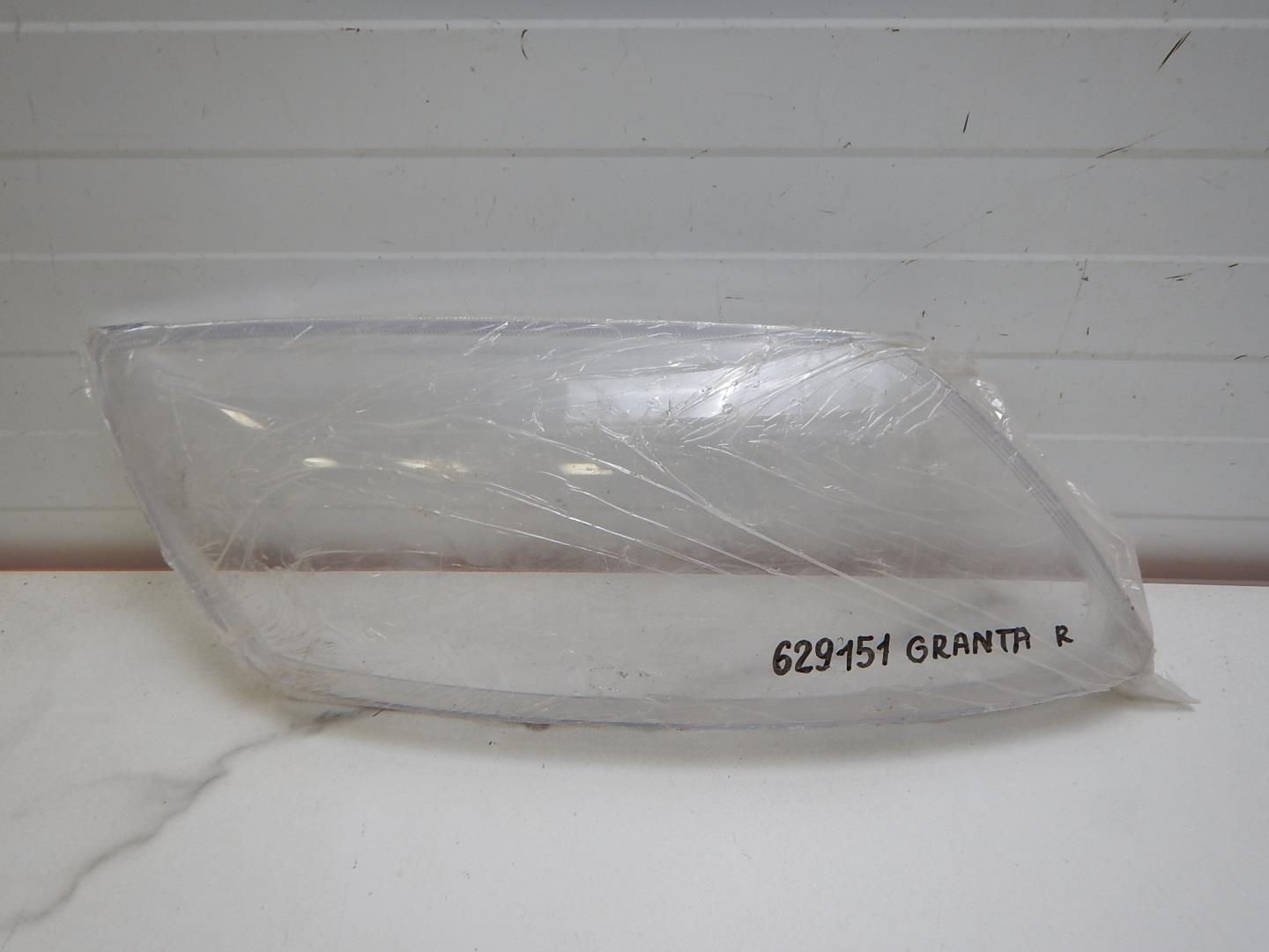 Стекло фары правой