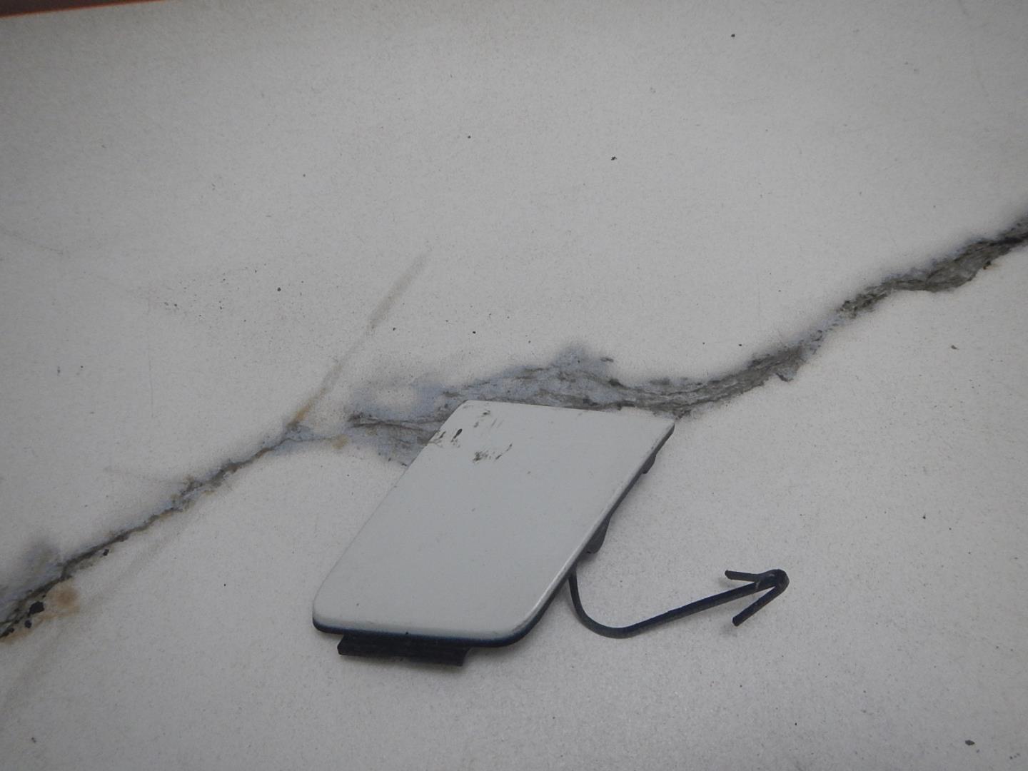 Заглушка буксировочного крюка