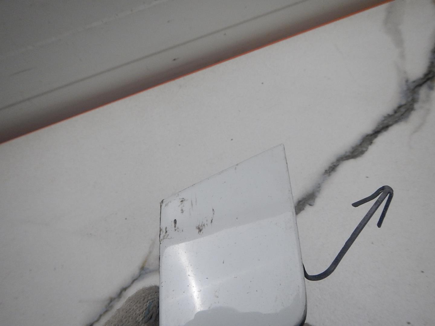 Заглушка буксировочного крюка