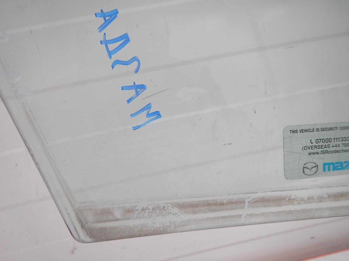 Стекло двери передней правой