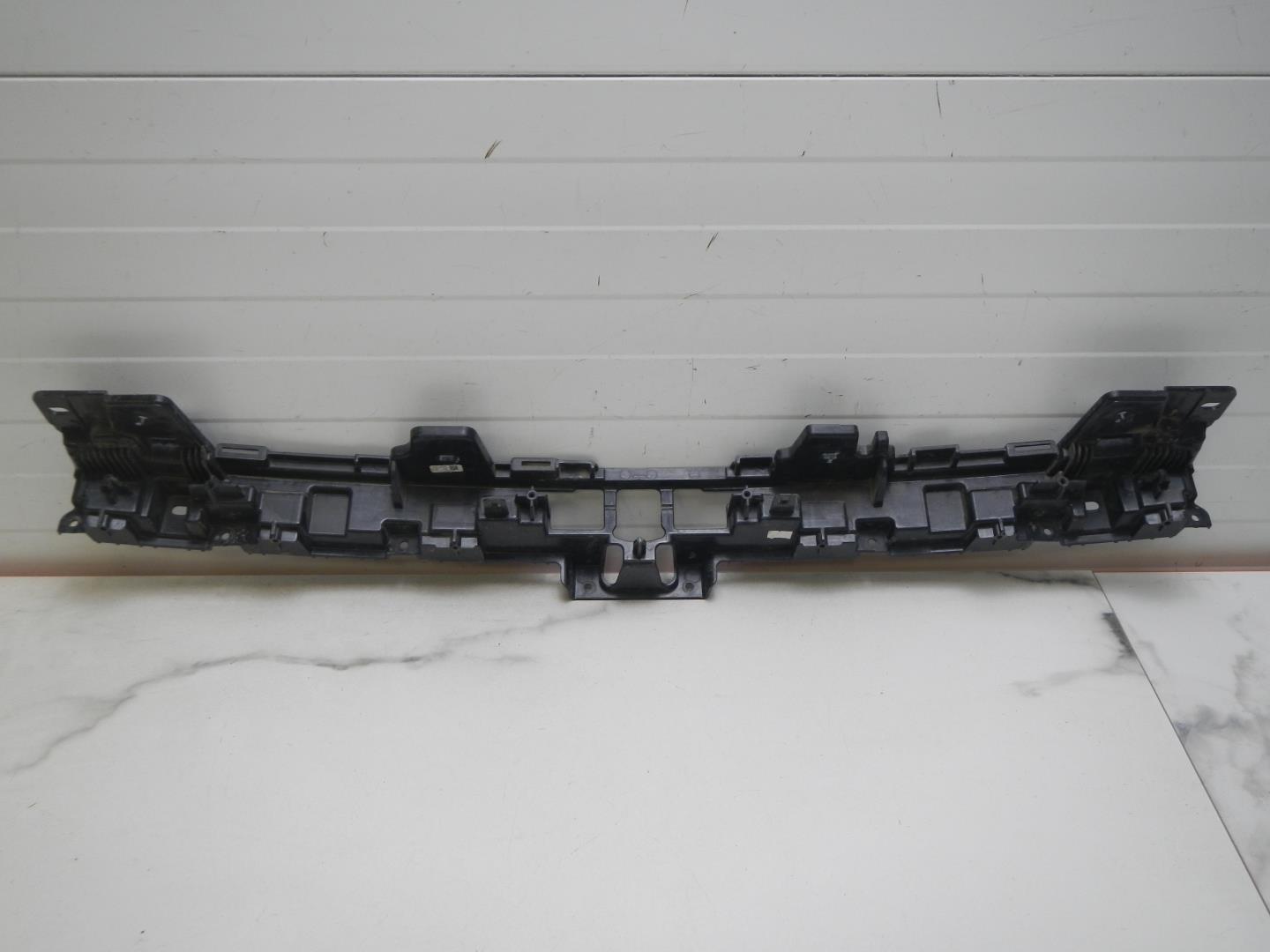 Кронштейн решетки радиатора