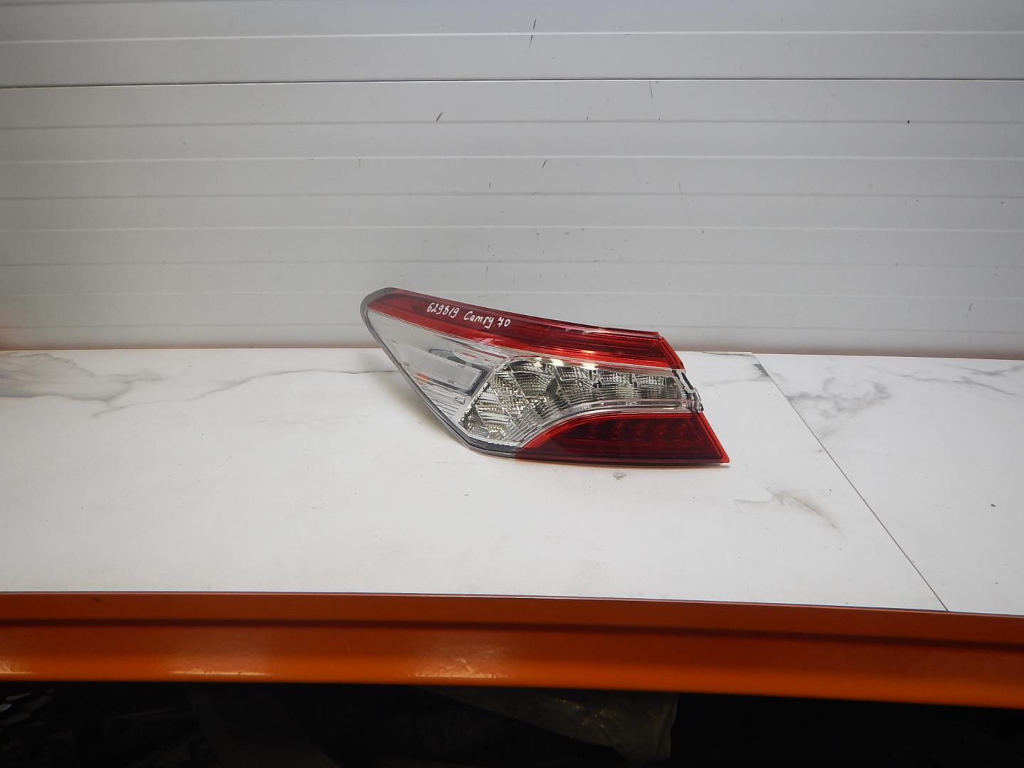 Фонарь задний левый