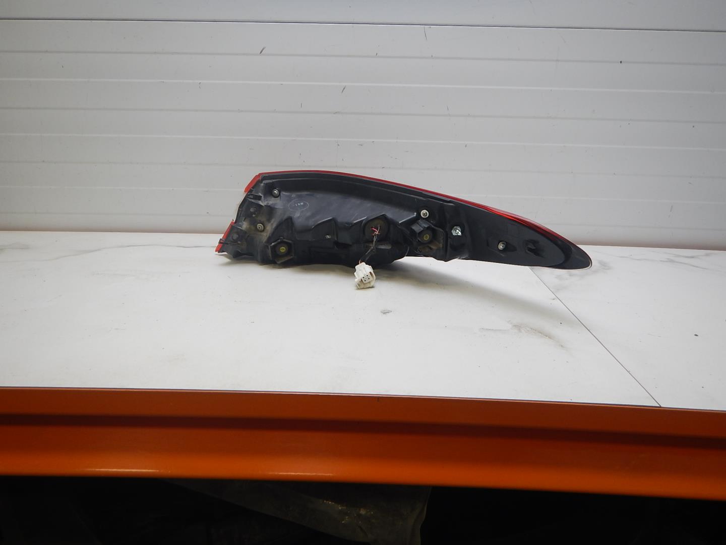 Фонарь задний левый