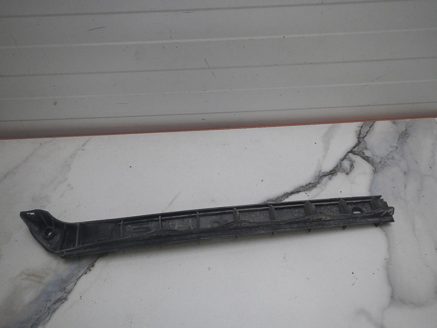 Кронштейн заднего бампера левый