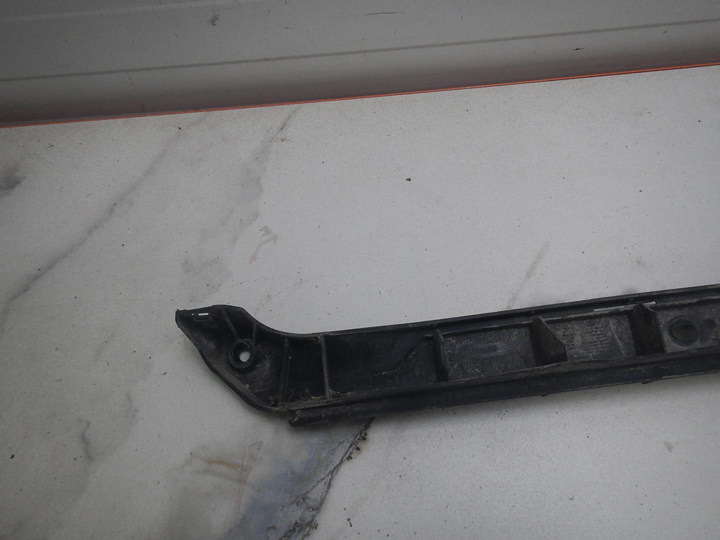 Кронштейн заднего бампера левый