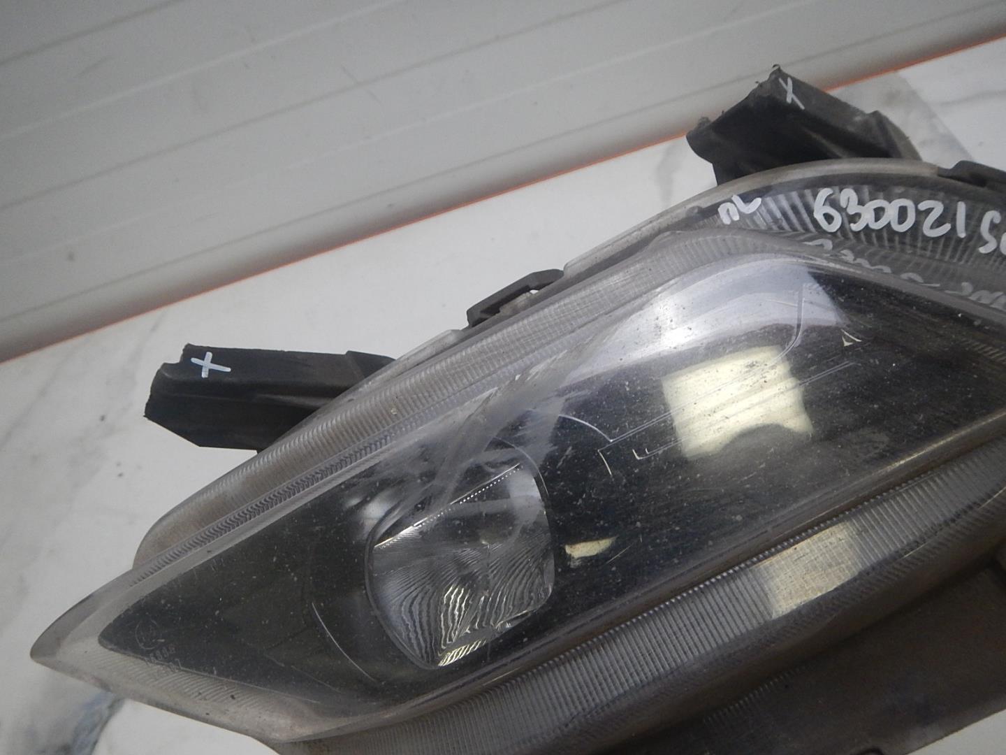 Фара противотуманная левая