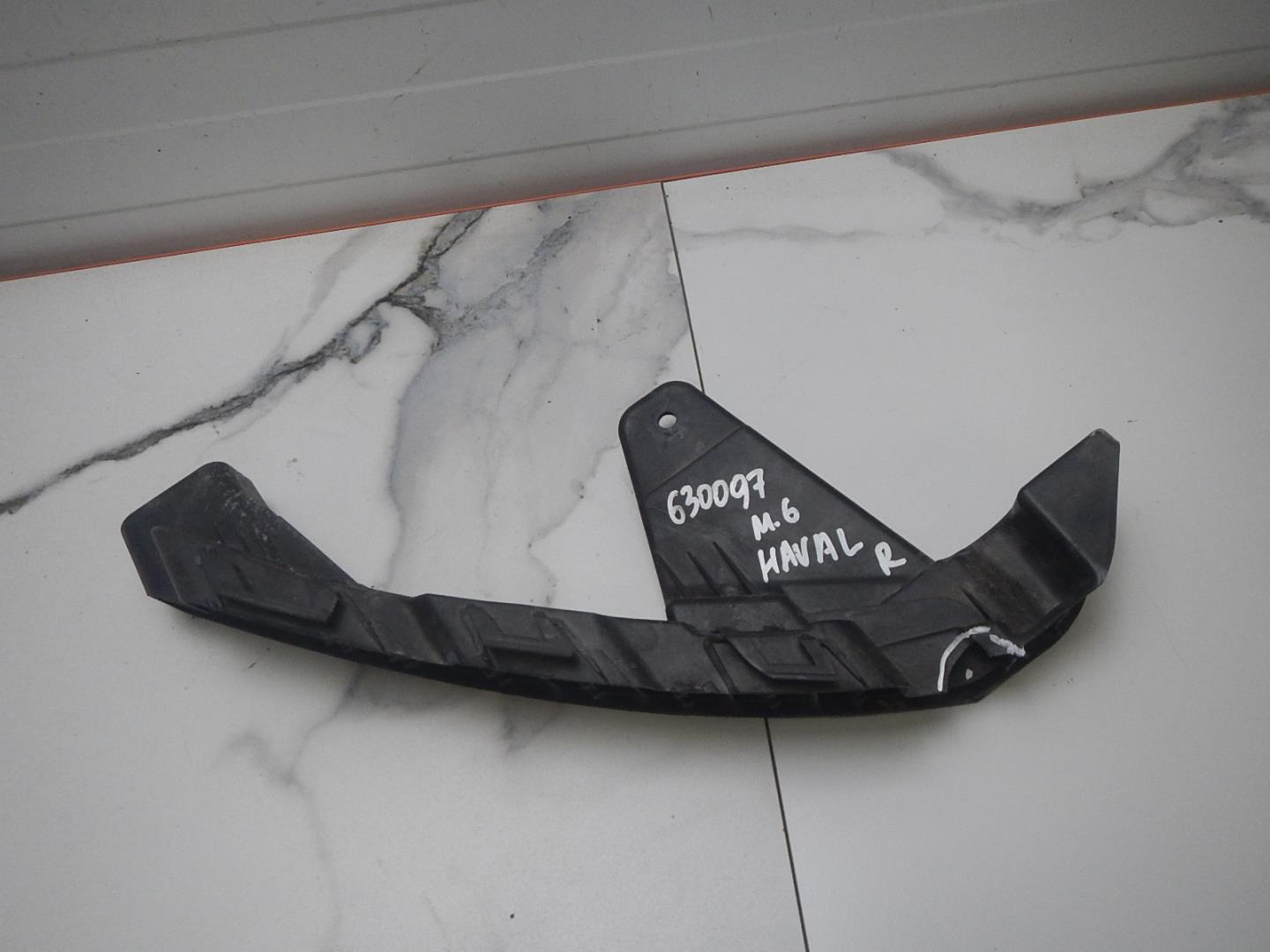 Кронштейн фар правый