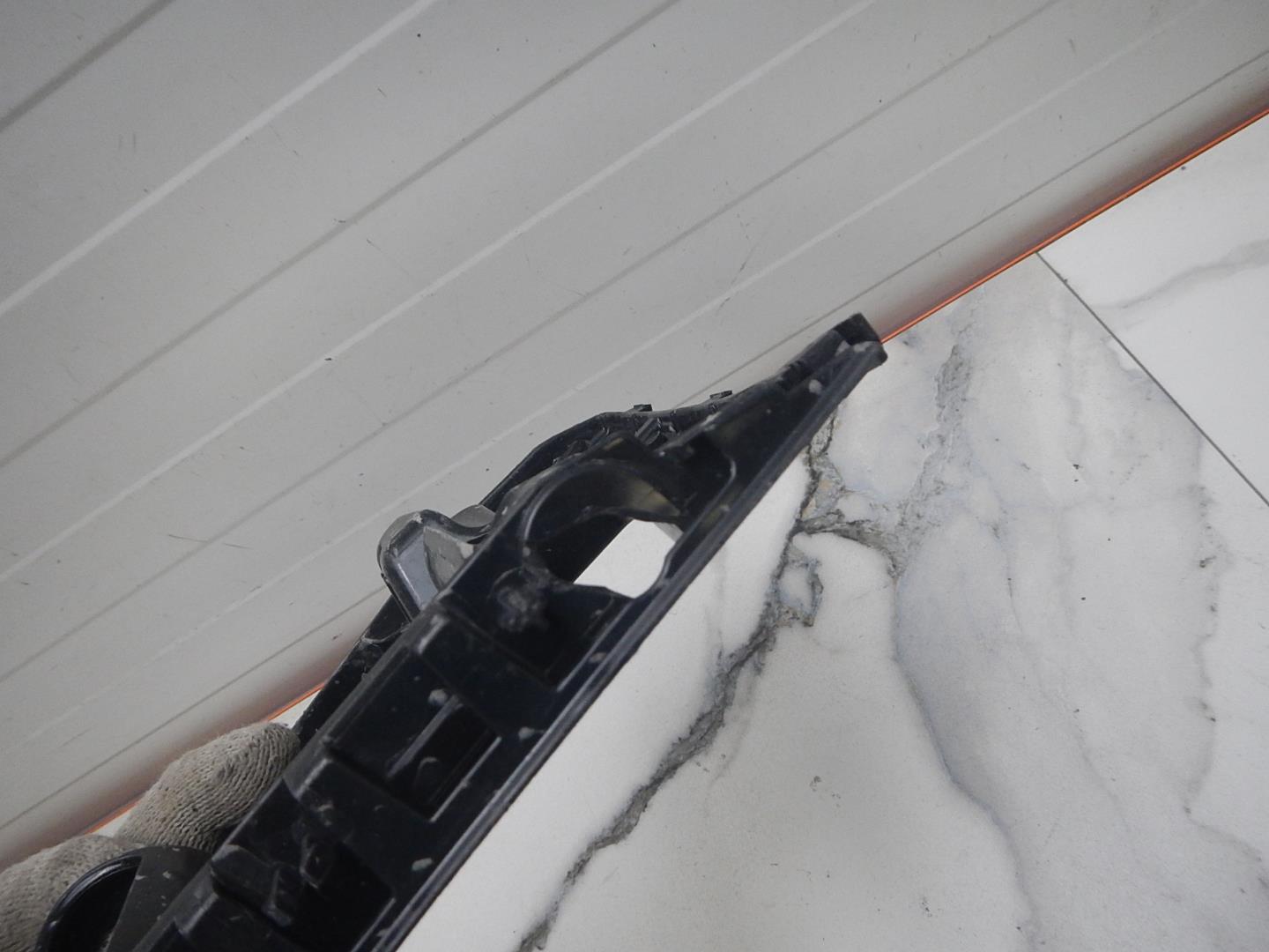 Кронштейн переднего бампера правый