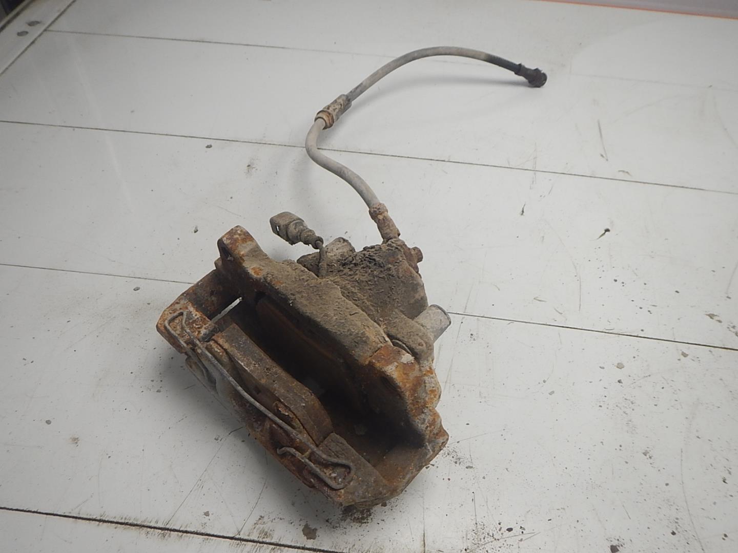 Суппорт передний левый