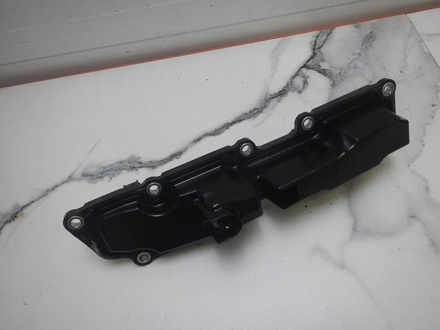 Маслозаборник