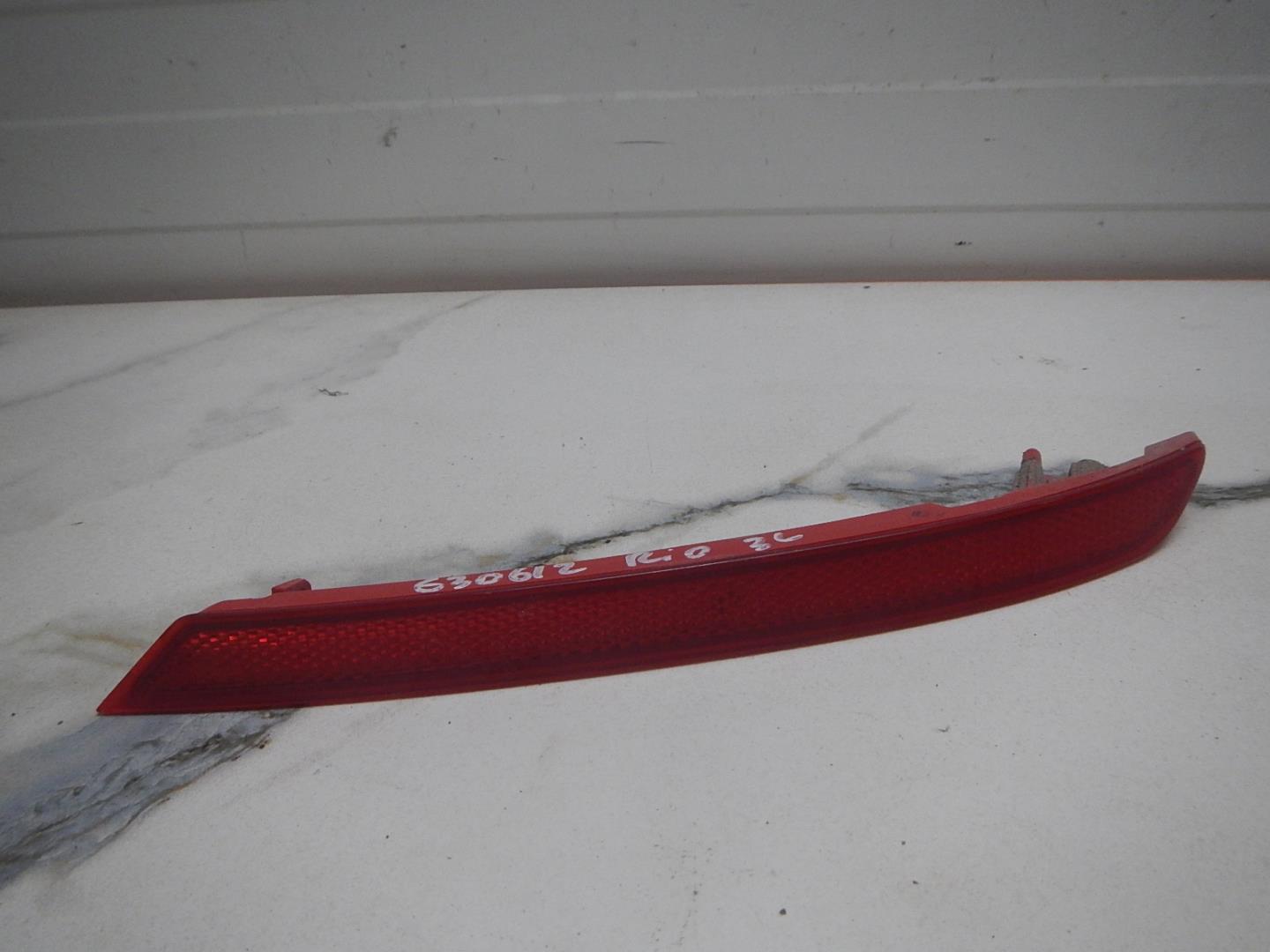 Отражатель в бампер задний левый