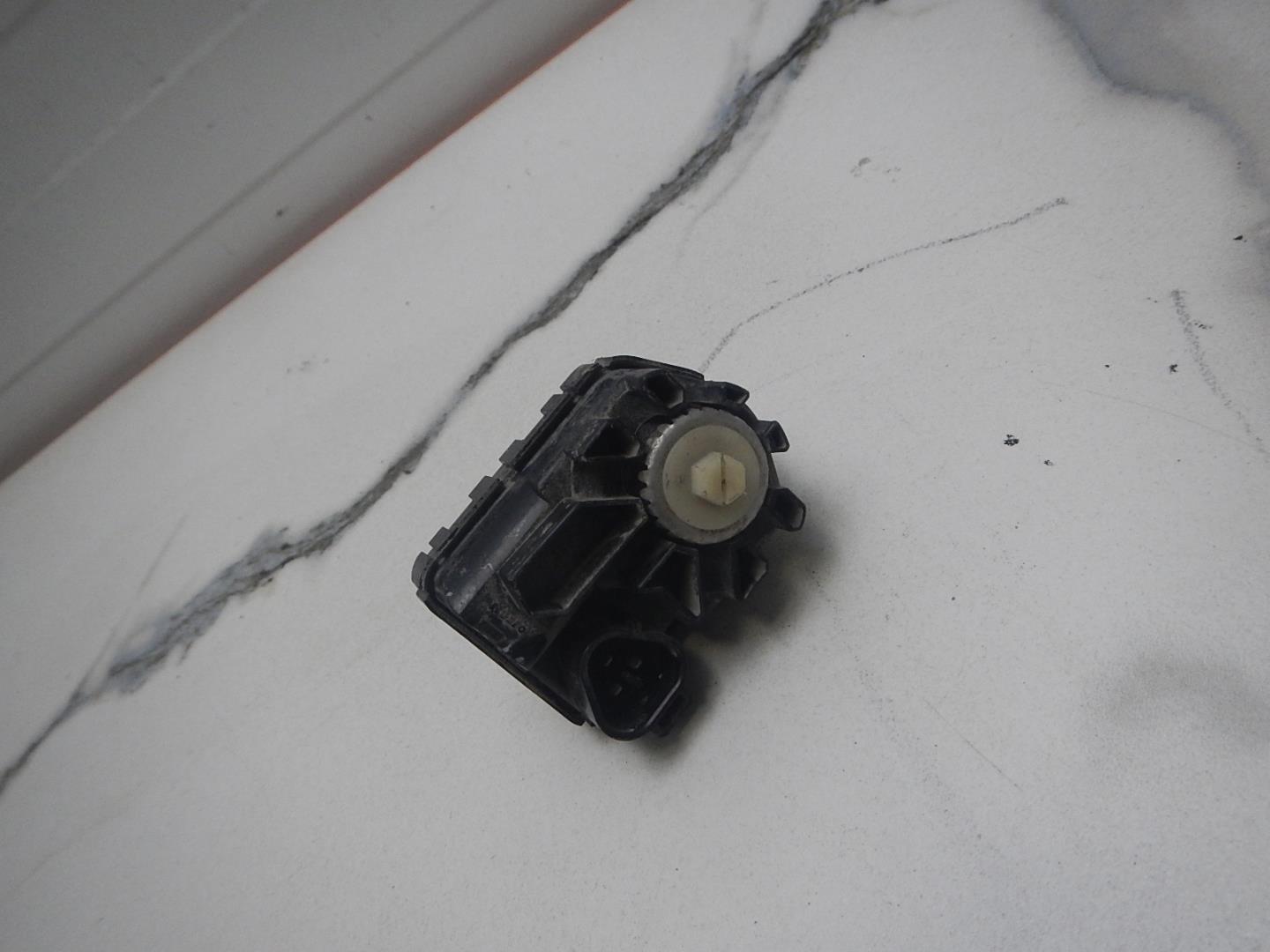 Моторчик корректора фары