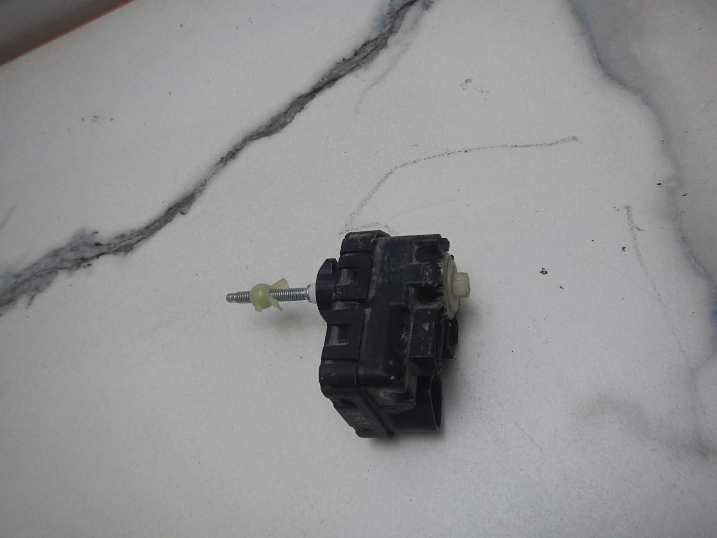 Моторчик корректора фары