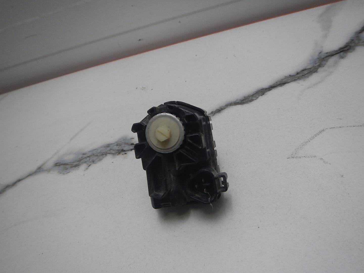 Моторчик корректора фары