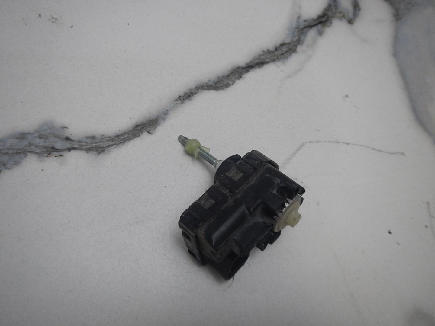 Моторчик корректора фары