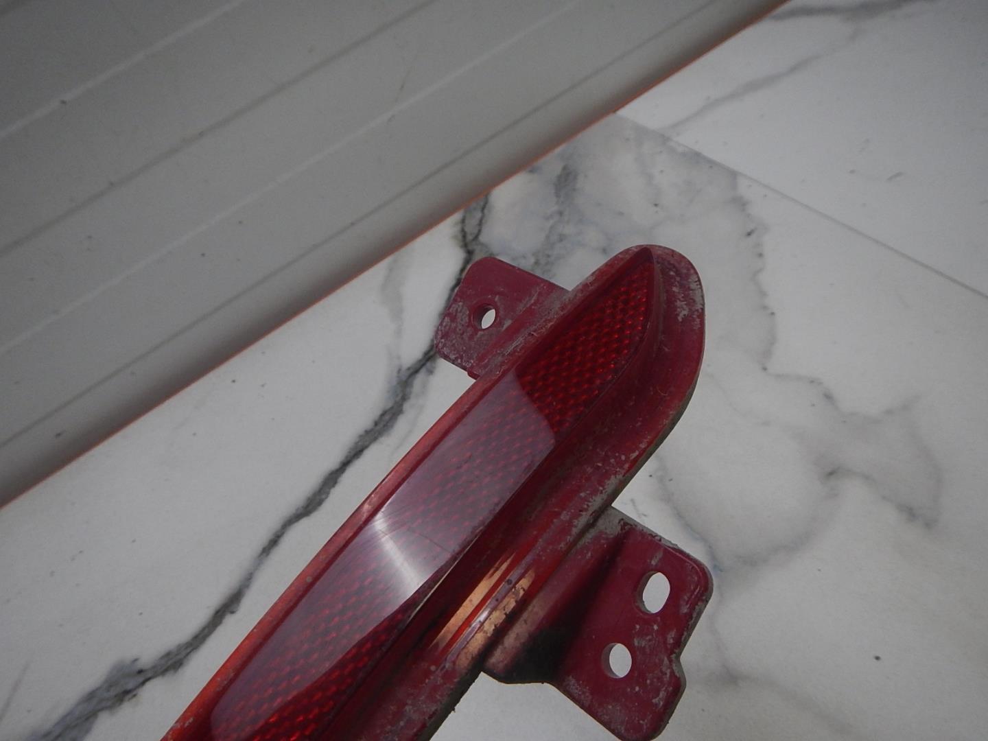 Отражатель в бампер задний правый