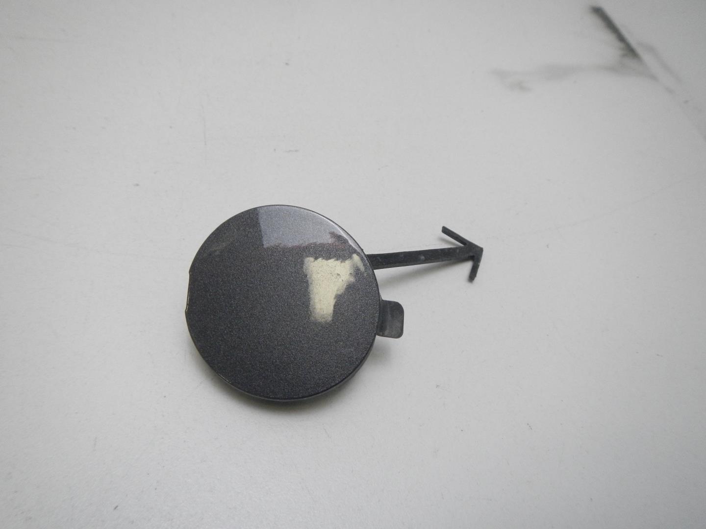 Заглушка буксировочного крюка