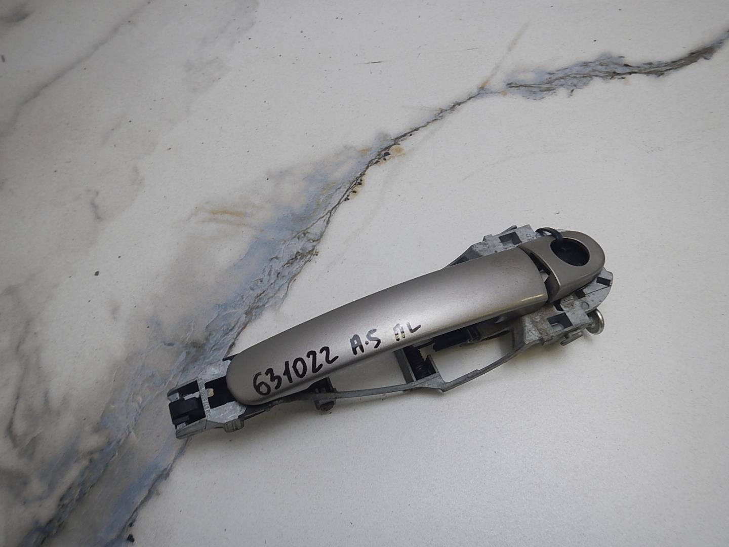 Ручка двери передней наружная левая