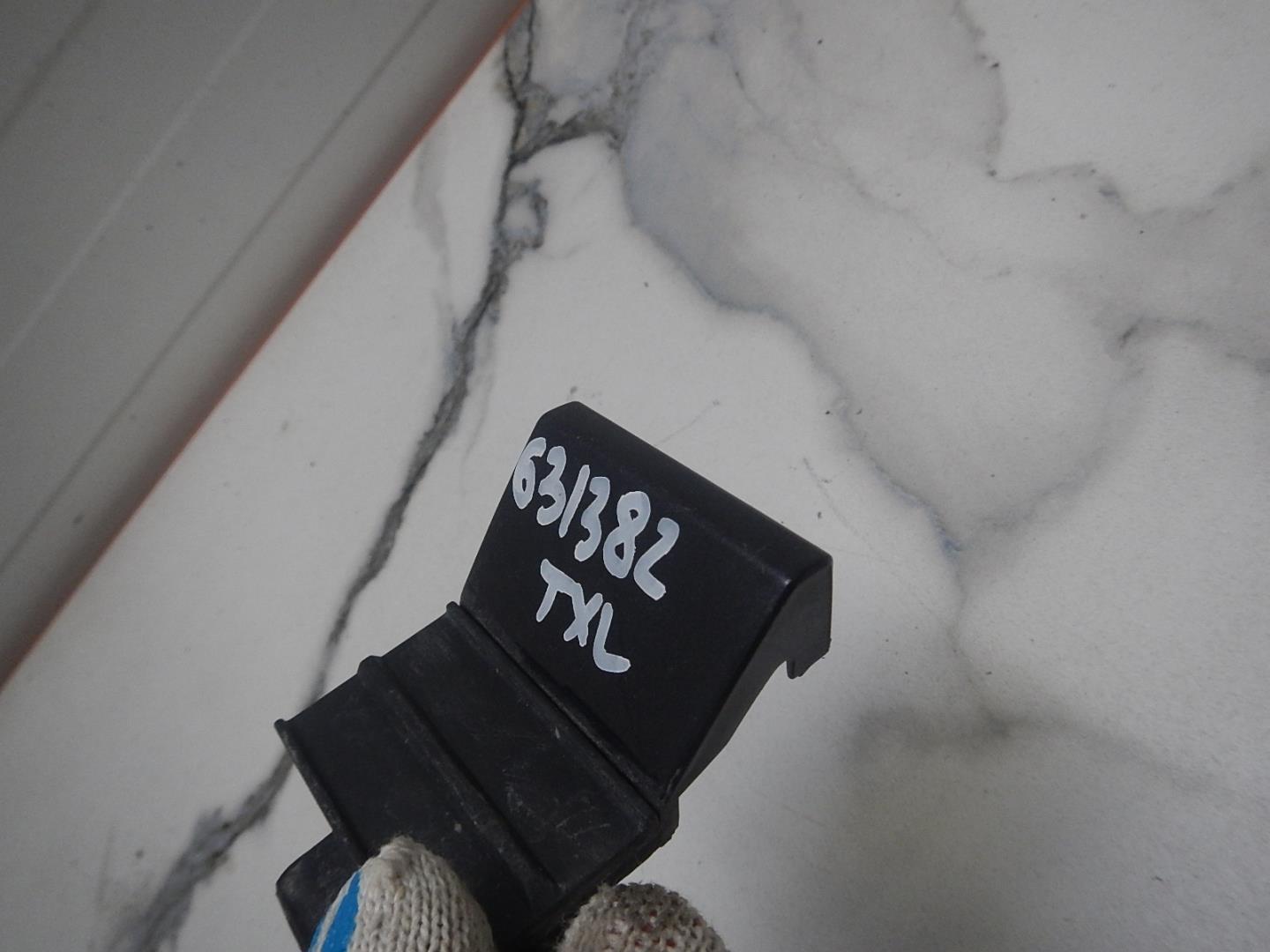 Заглушка буксировочного крюка