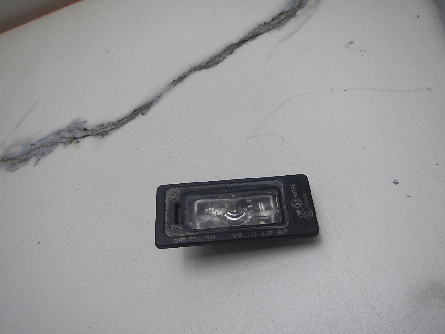 Фонарь подсветки номера