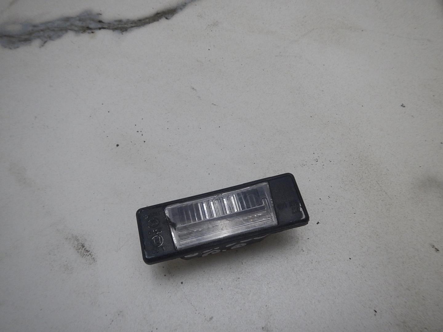 Фонарь подсветки номера