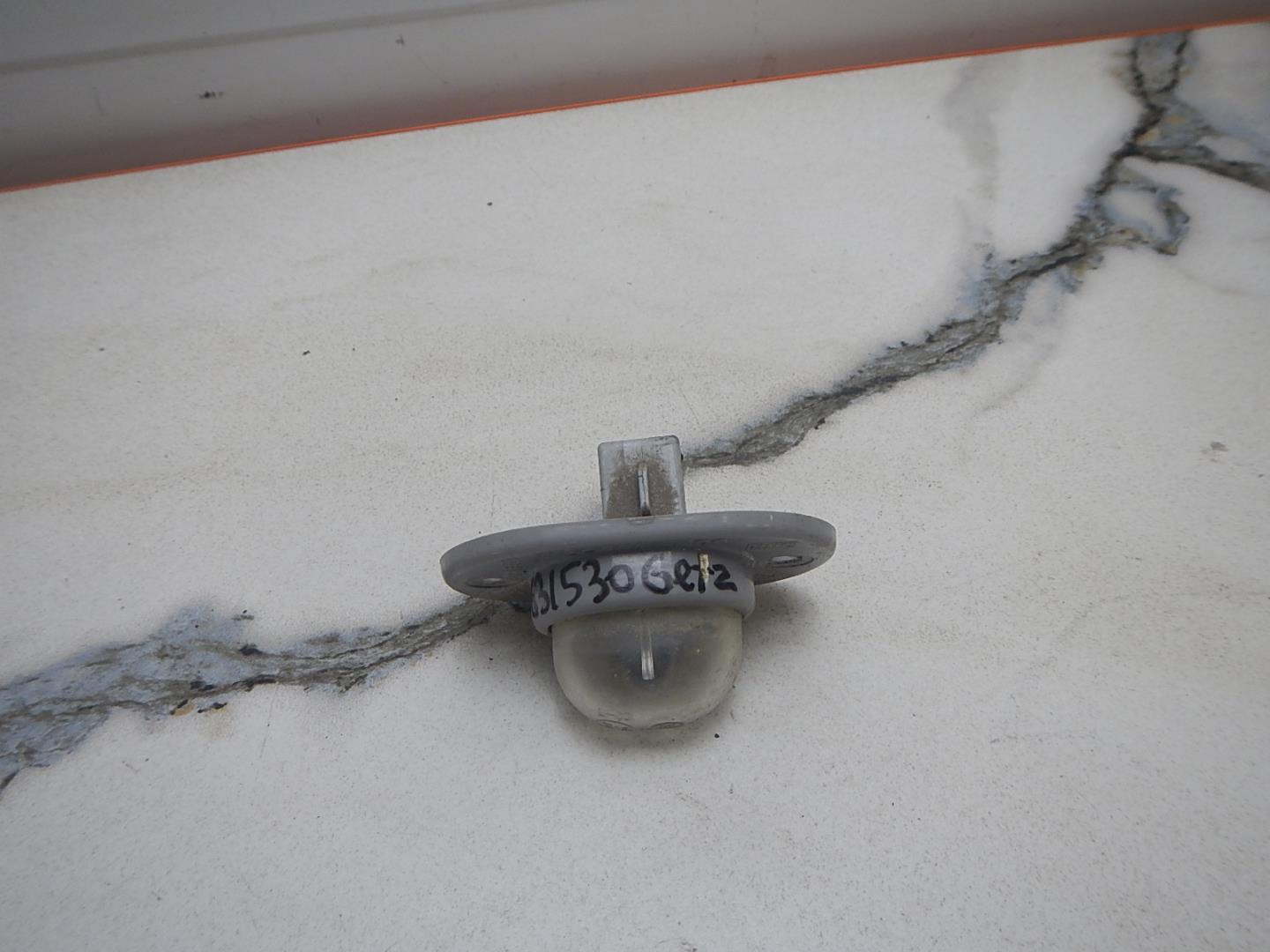 Фонарь подсветки номера