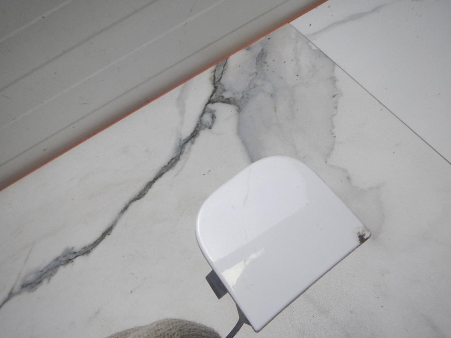 Заглушка буксировочного крюка