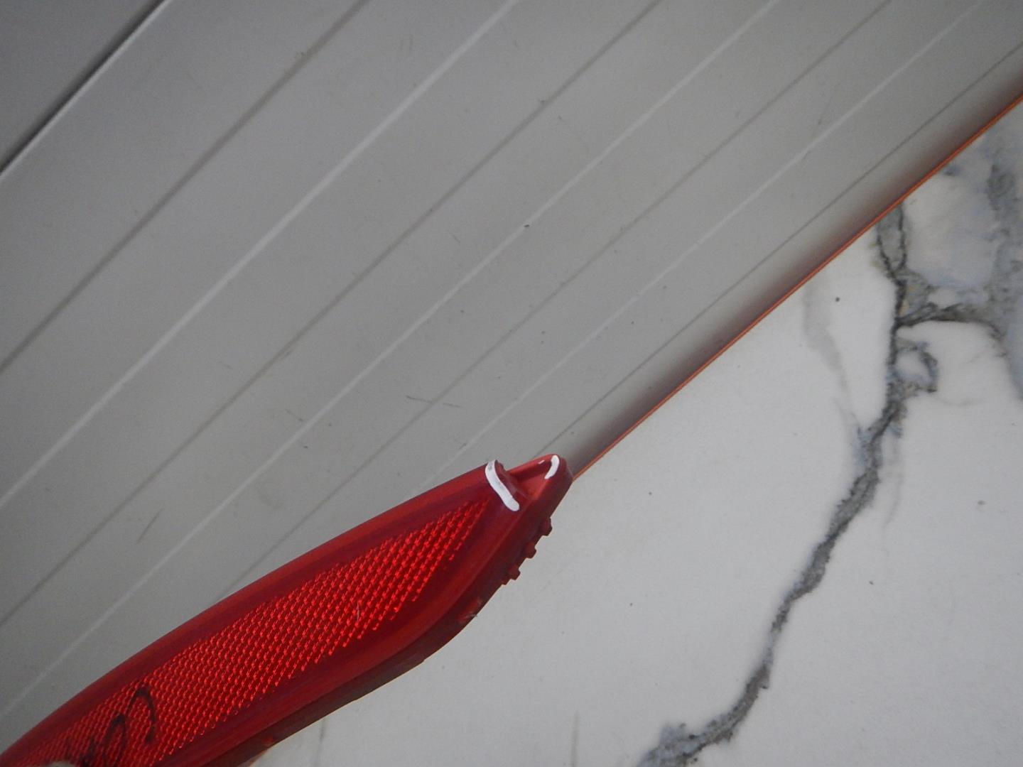 Отражатель в бампер задний левый