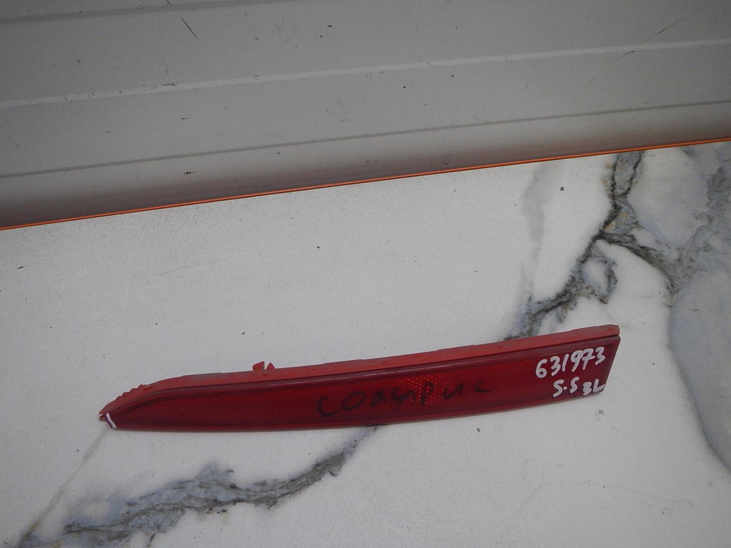 Отражатель в бампер задний левый