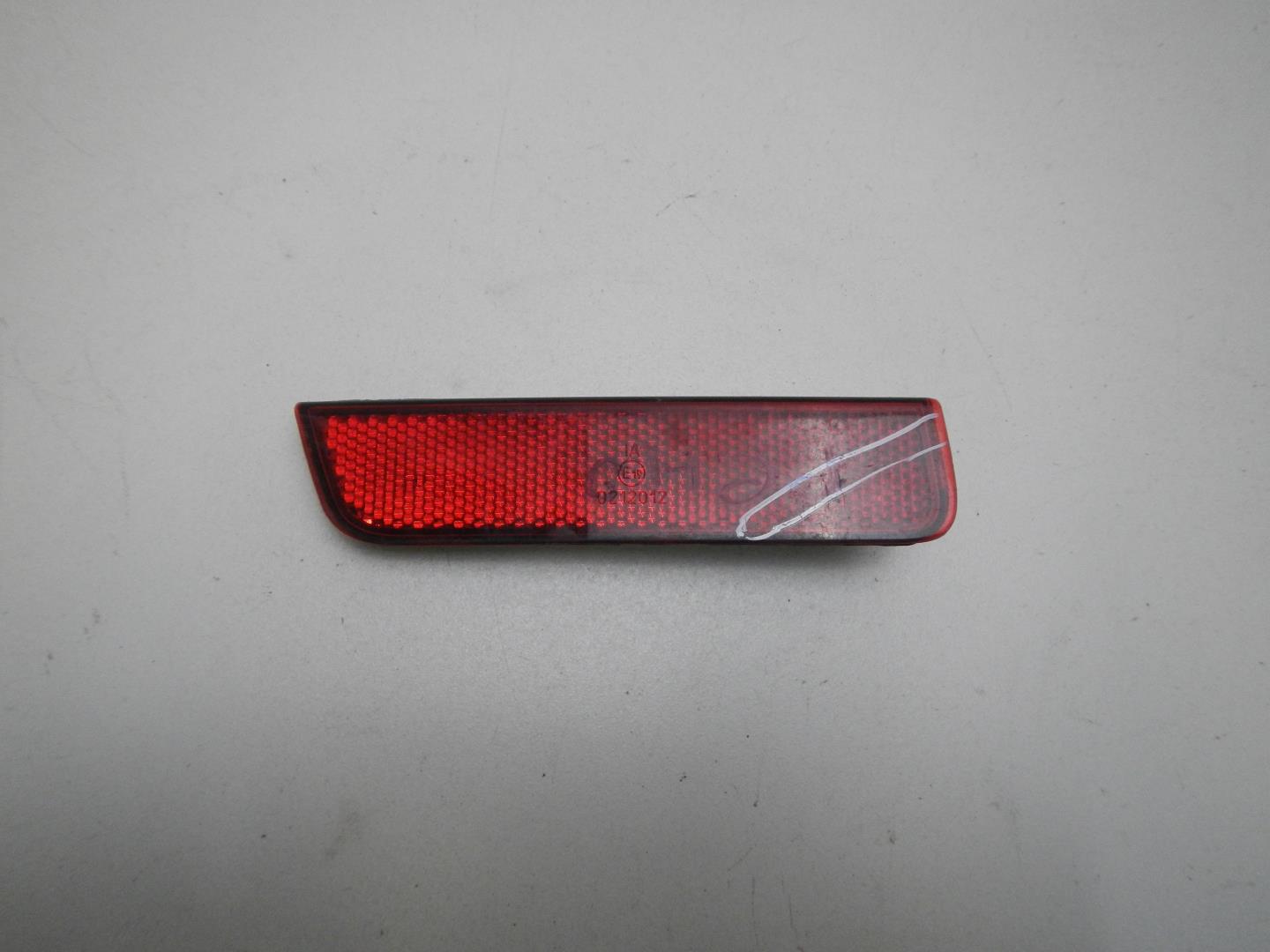 Отражатель в бампер задний левый