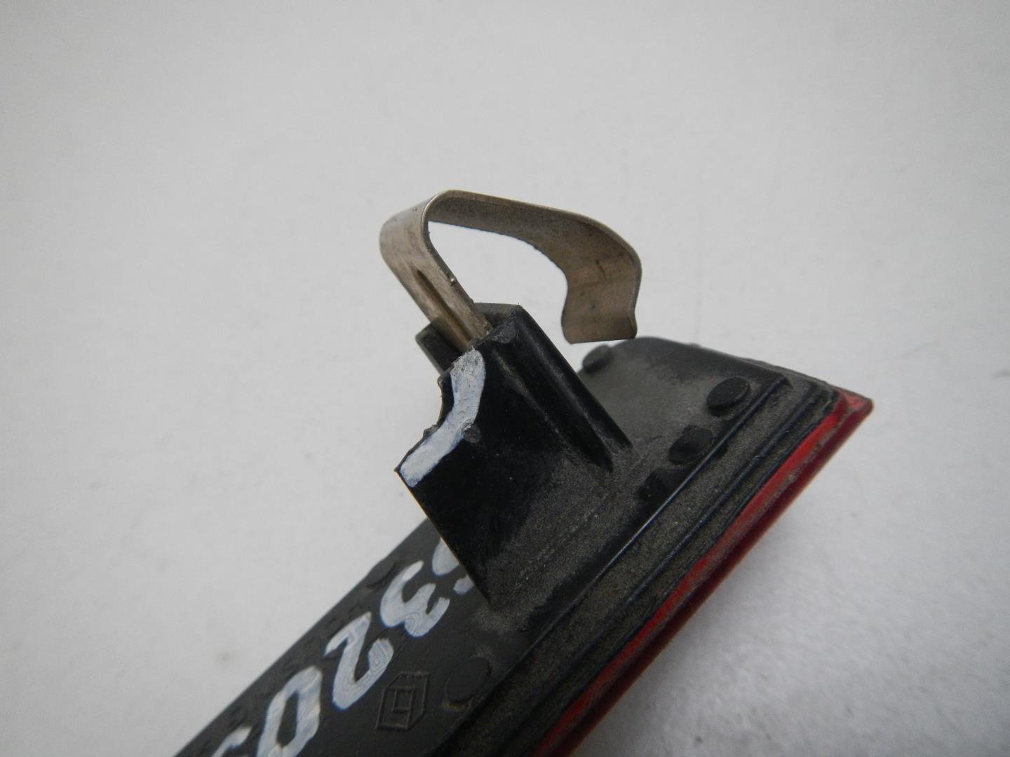 Отражатель в бампер задний левый