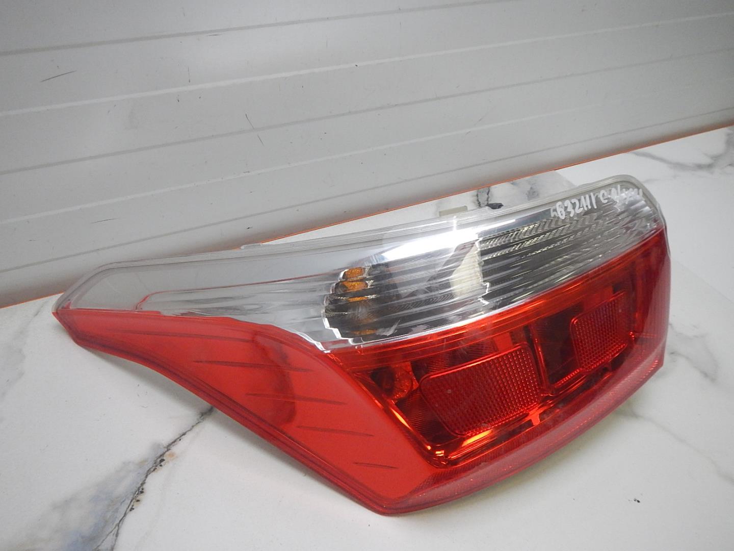 Фонарь задний левый