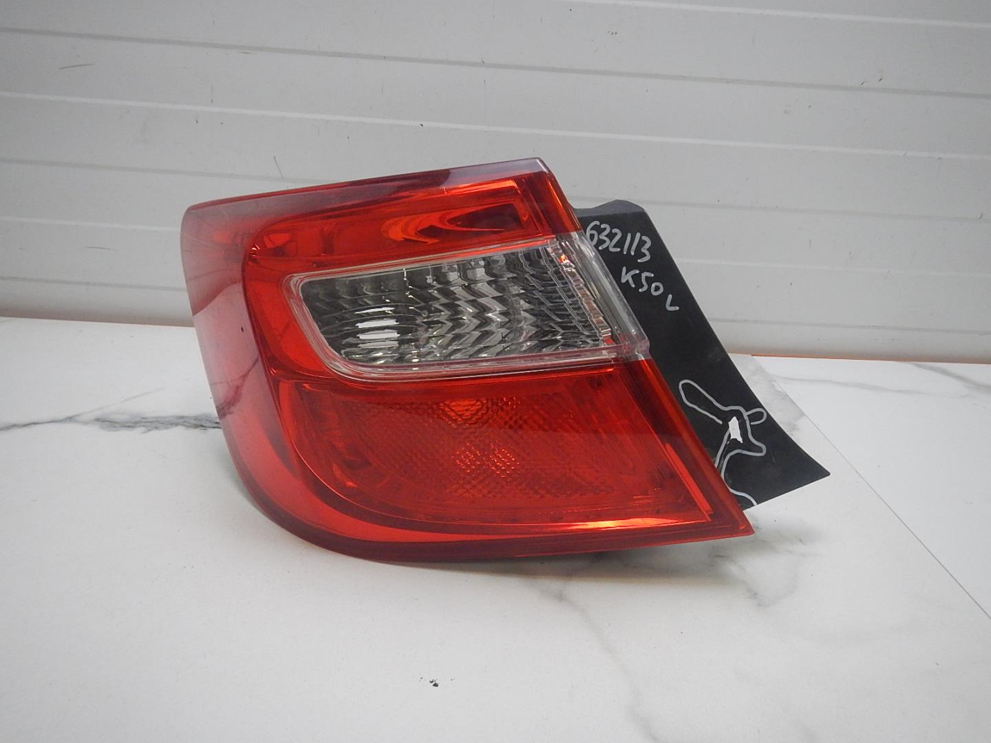 Фонарь задний левый