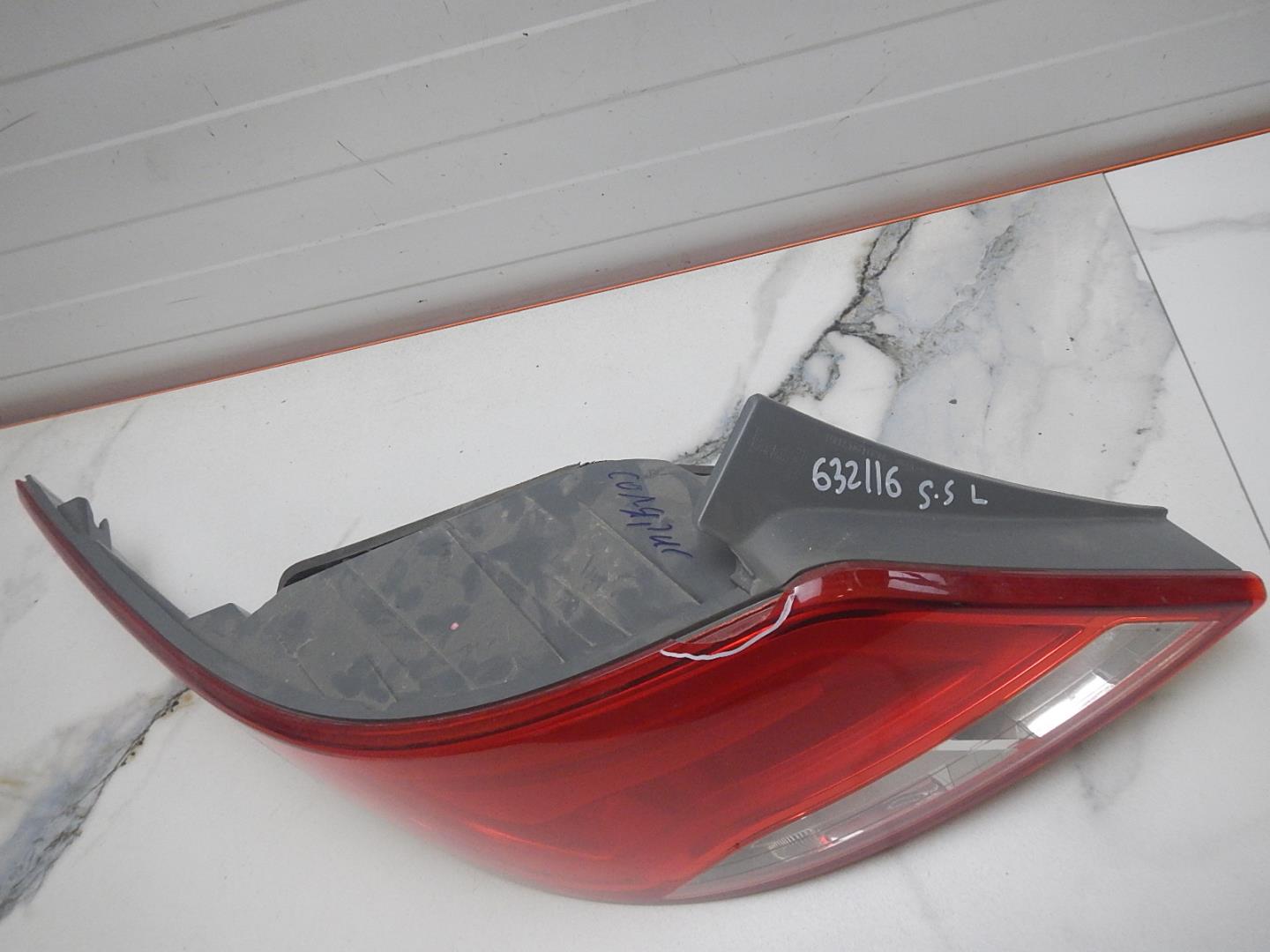 Фонарь задний левый