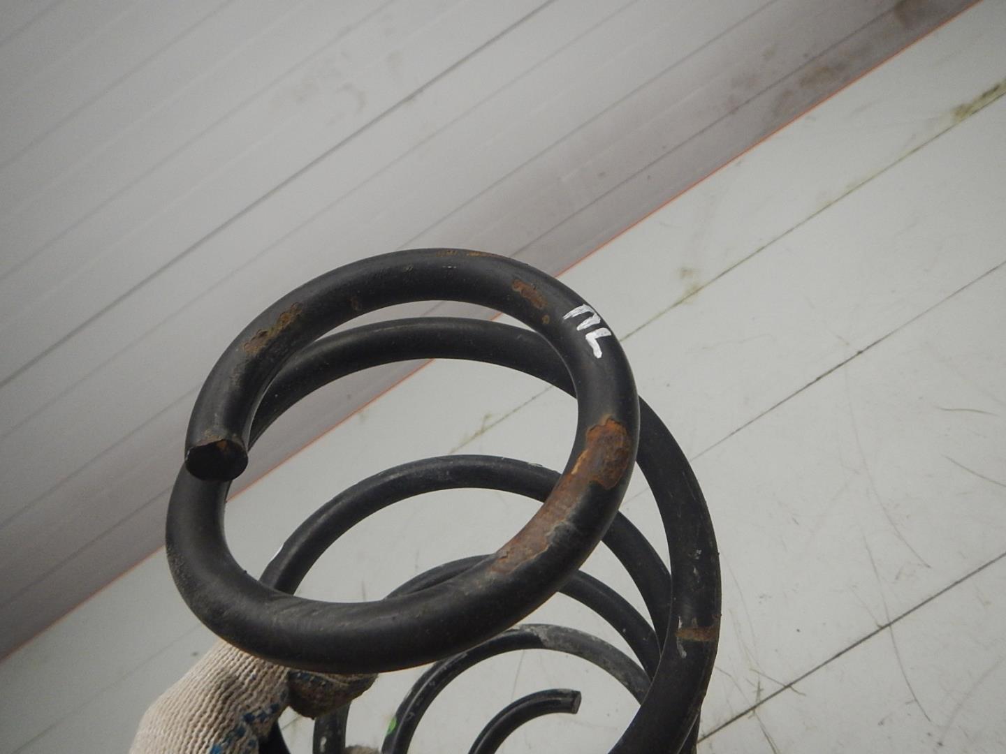 Пружина передняя