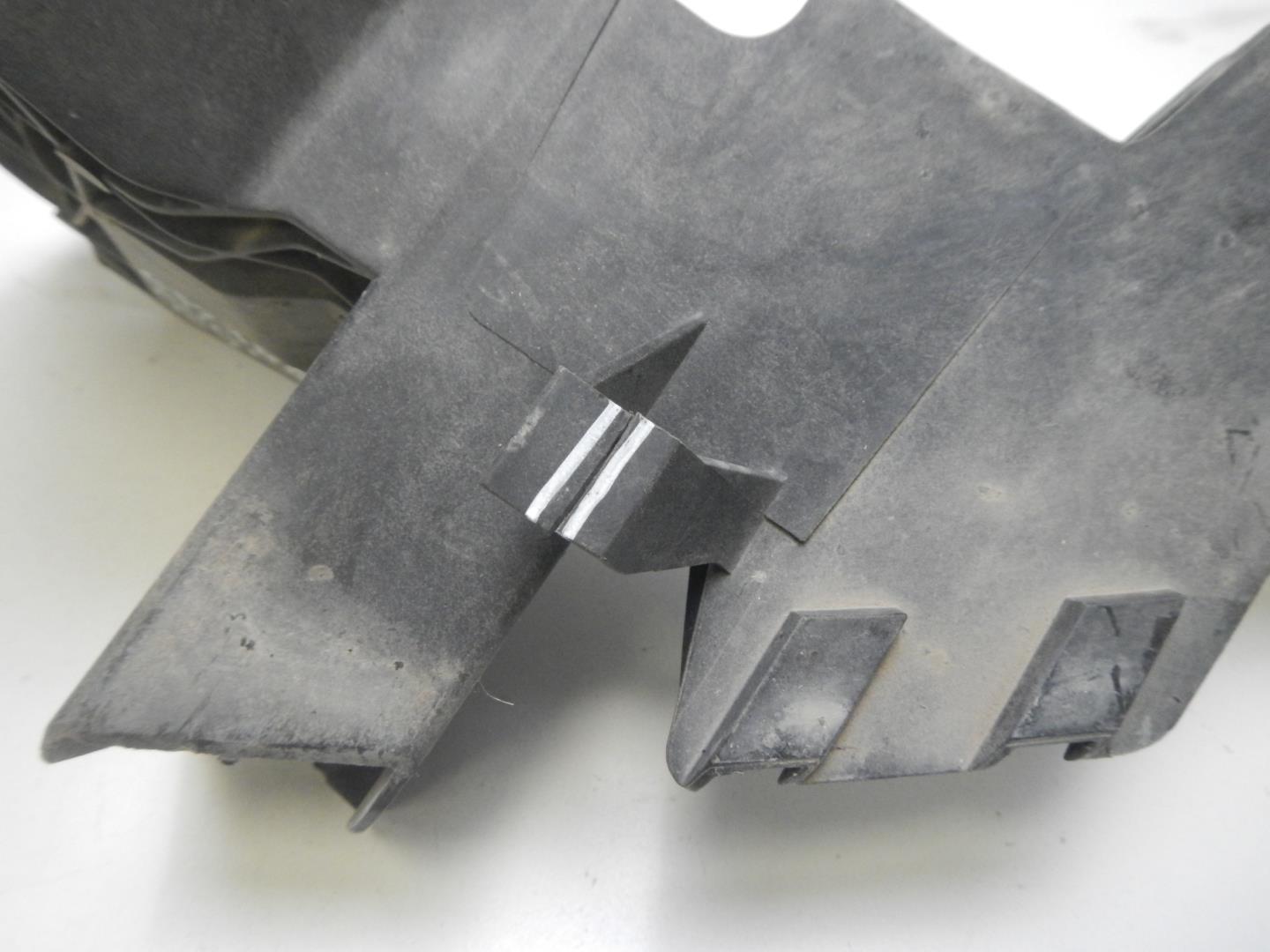 Кронштейн фар левый