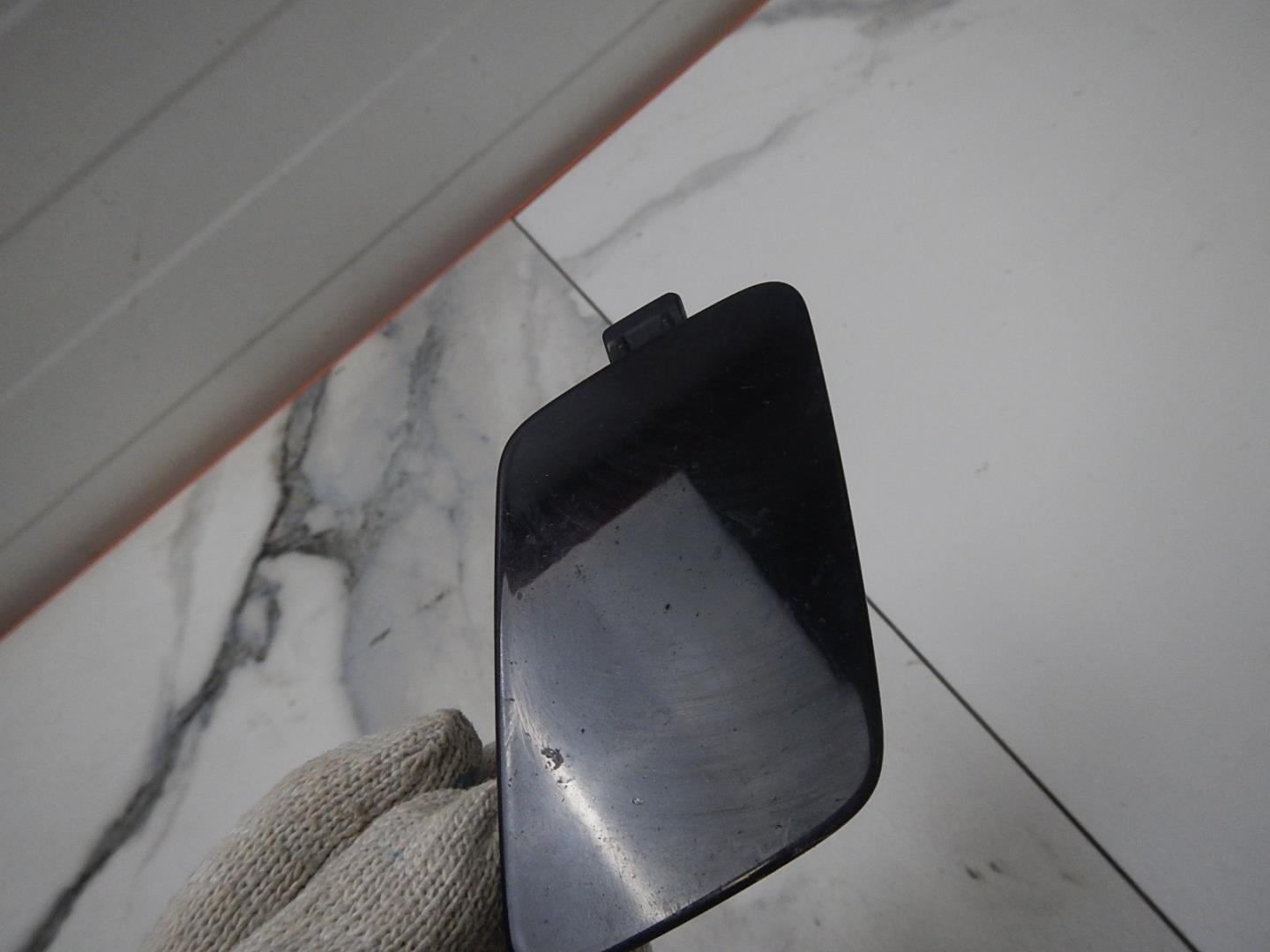 Заглушка буксировочного крюка