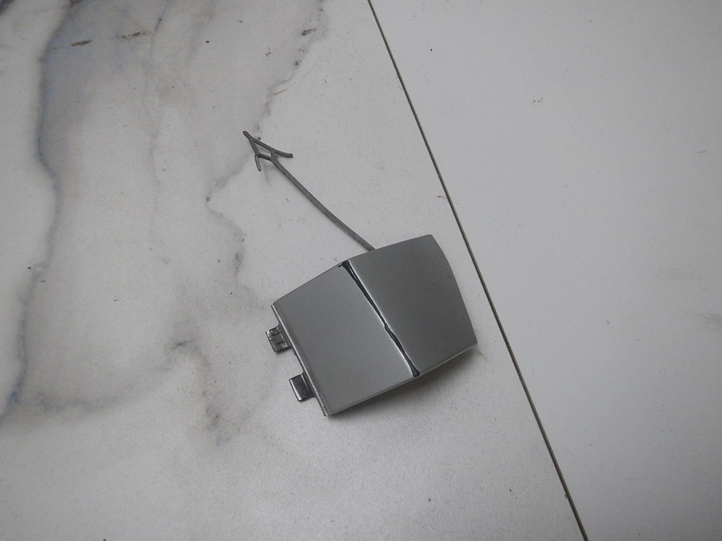 Заглушка буксировочного крюка